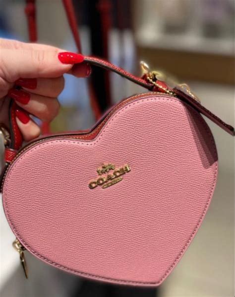bolsa coach coracao